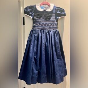 Anavini hand smocked Elegant Navy and white dress in size 5.